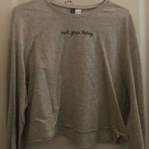 ‘not your baby’ cropped long sleeve shirt